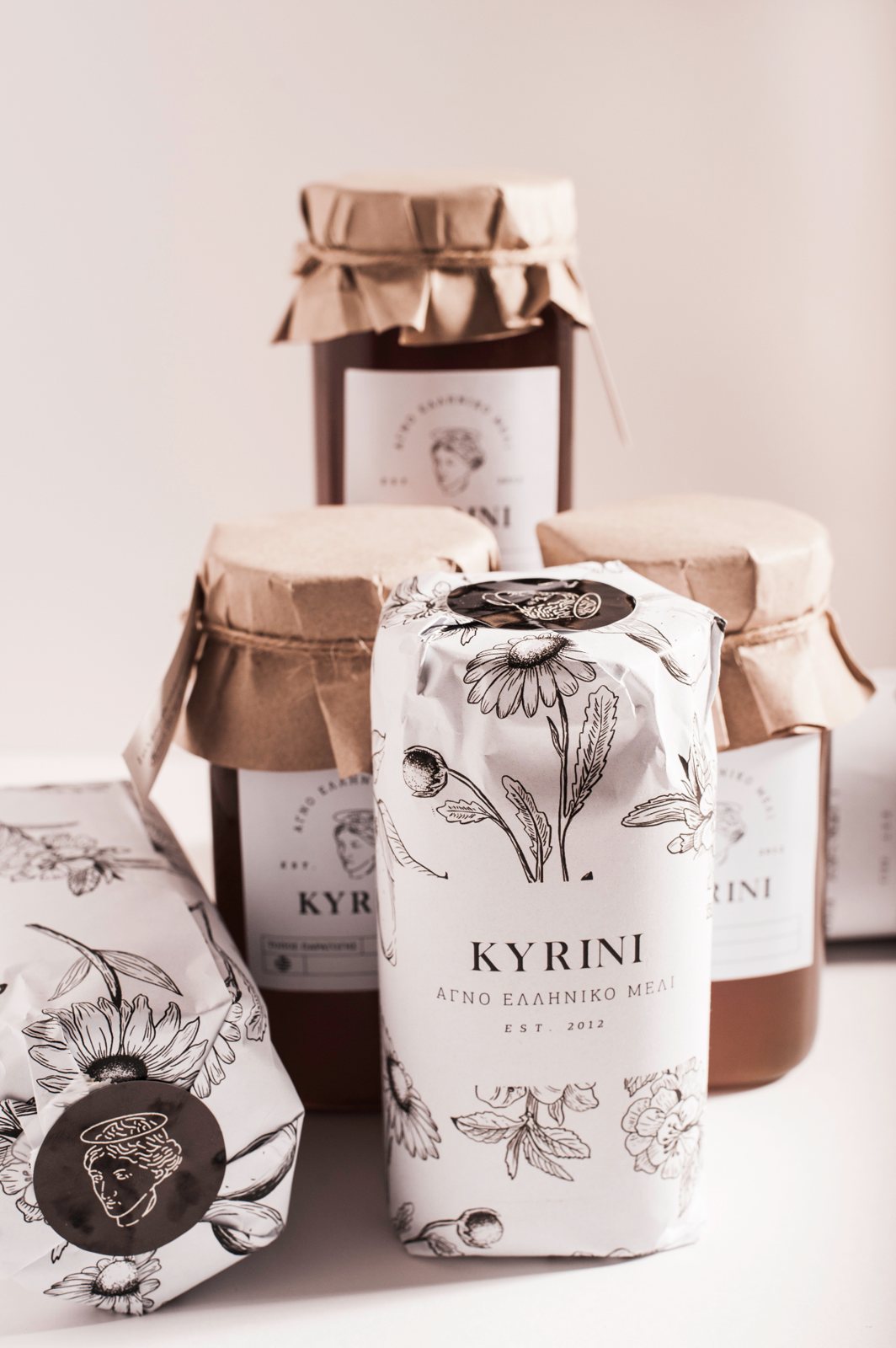 KYRINI honey jar with paper cover and packaging