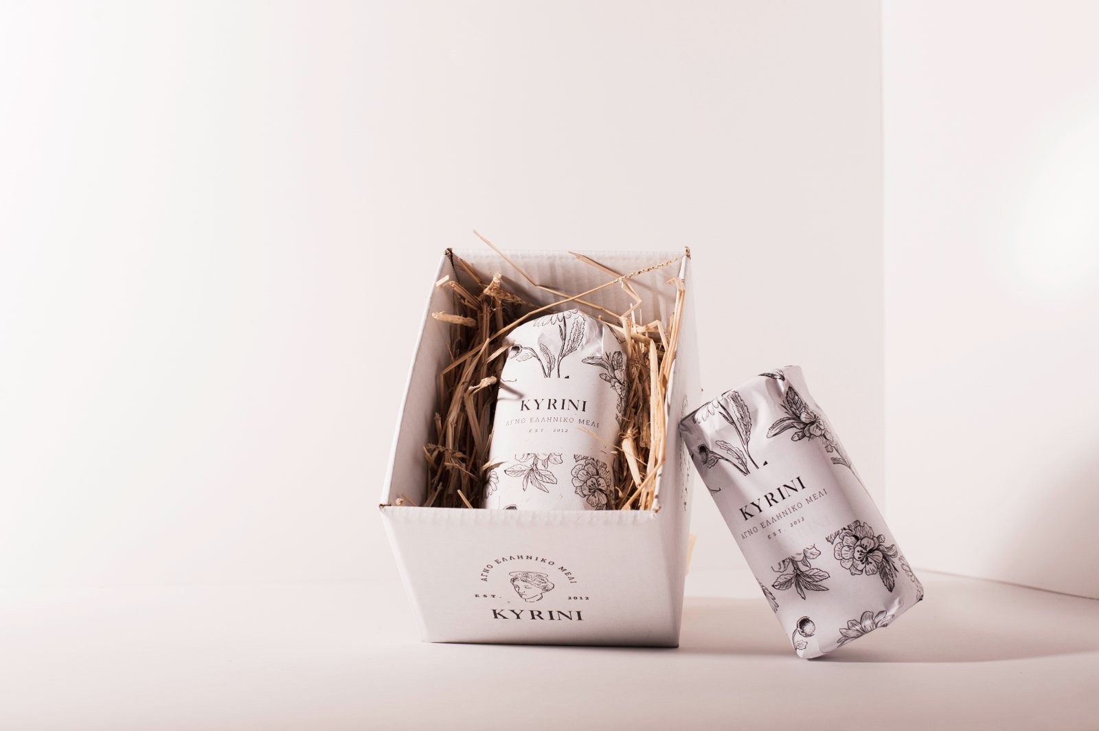 KYRINI honey jar with paper cover and packaging